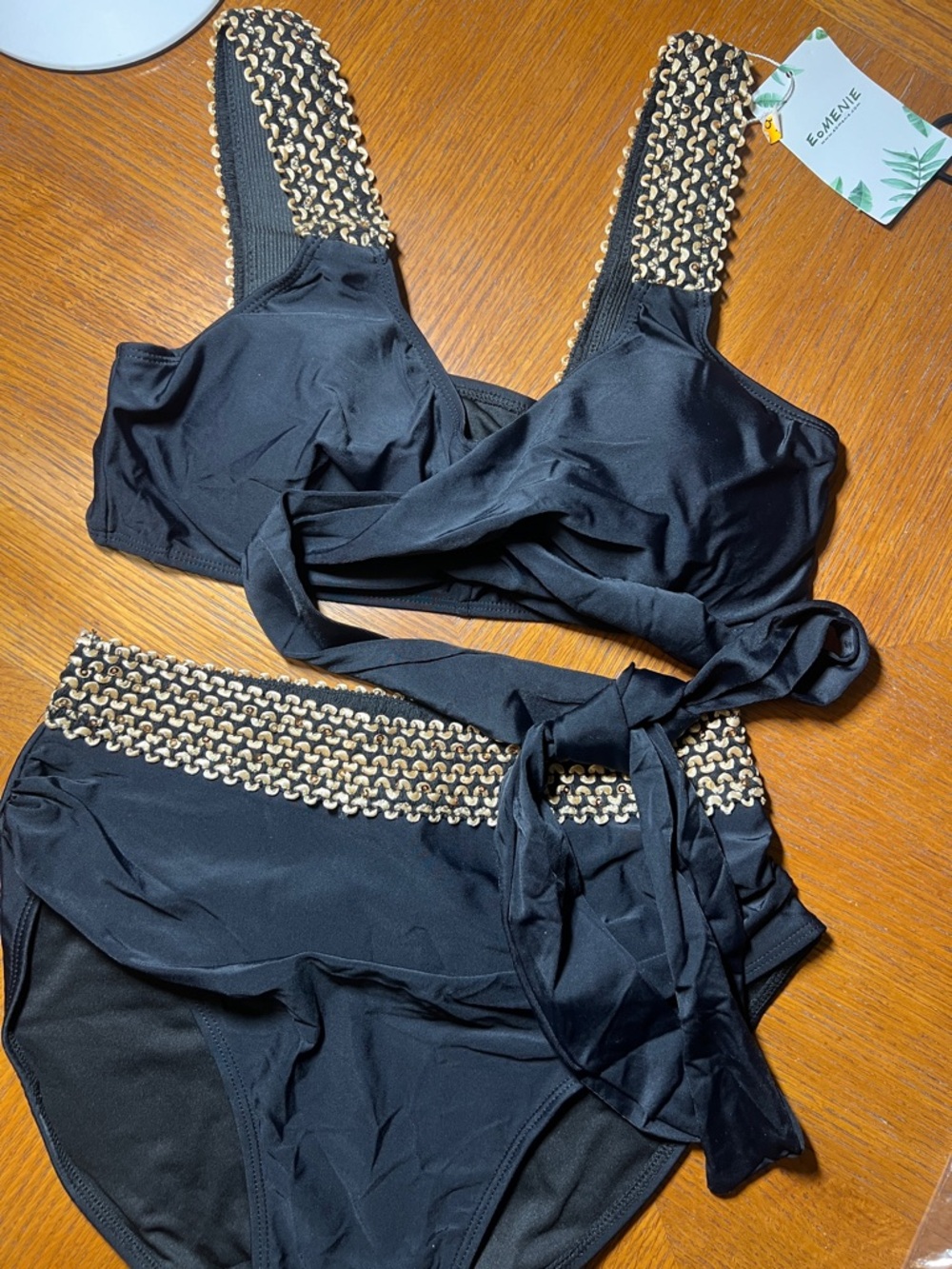 Sleek Black High-Waist Bikini with Gold Chain Embellishment